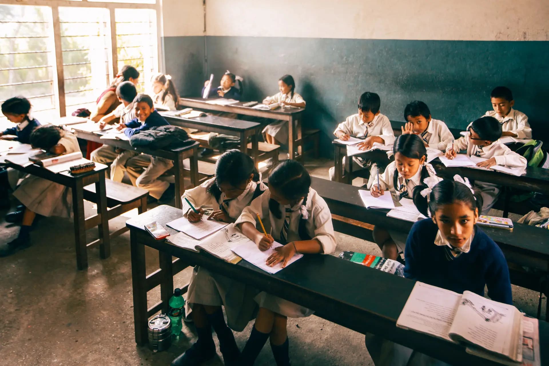 Students working at their desks in a classroom